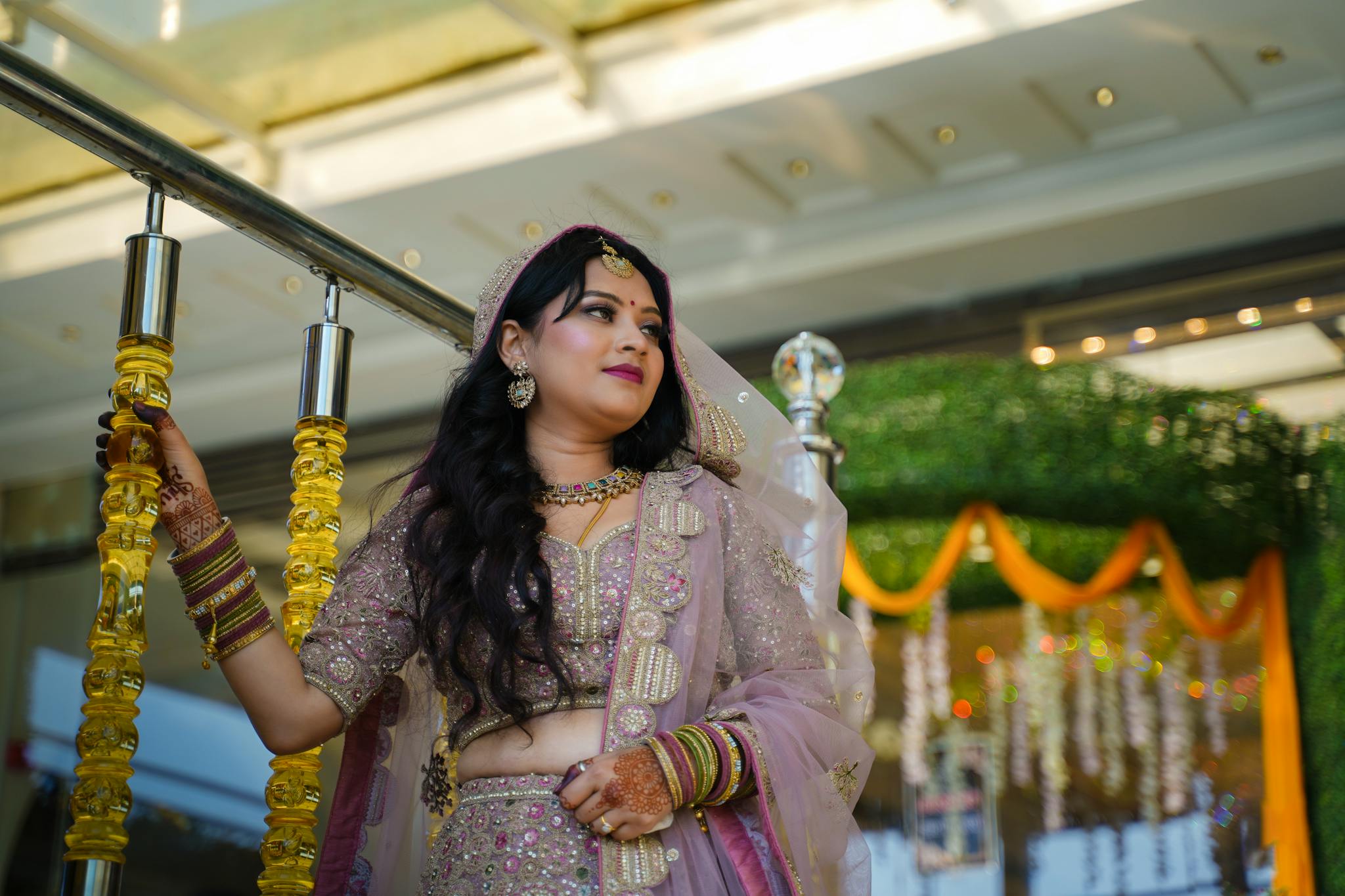 A beautiful Indian bride in traditional attire captured in Varanasi during a wedding ceremony.